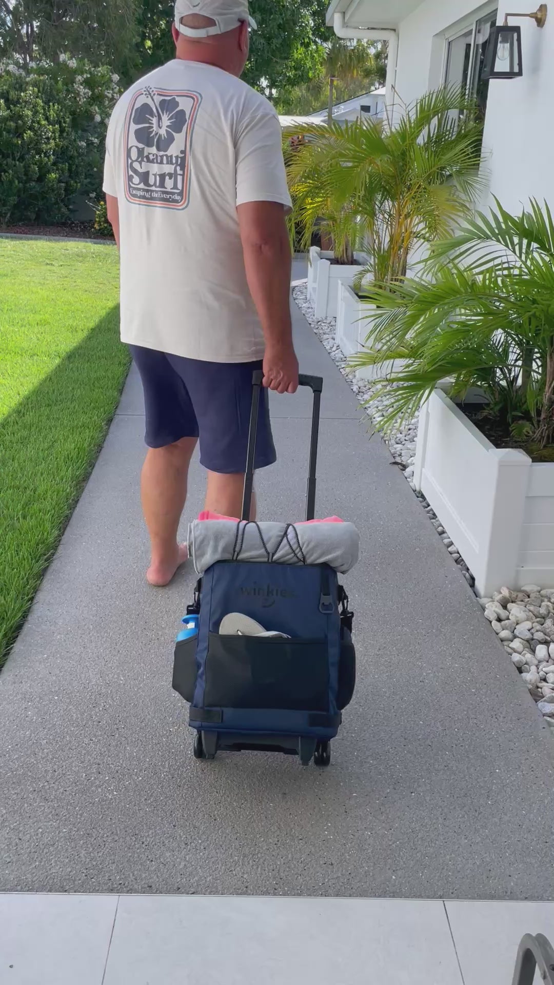  Long, Easy Pull handle, wide wheel base prevents tipping over when full - Just a great cooler.